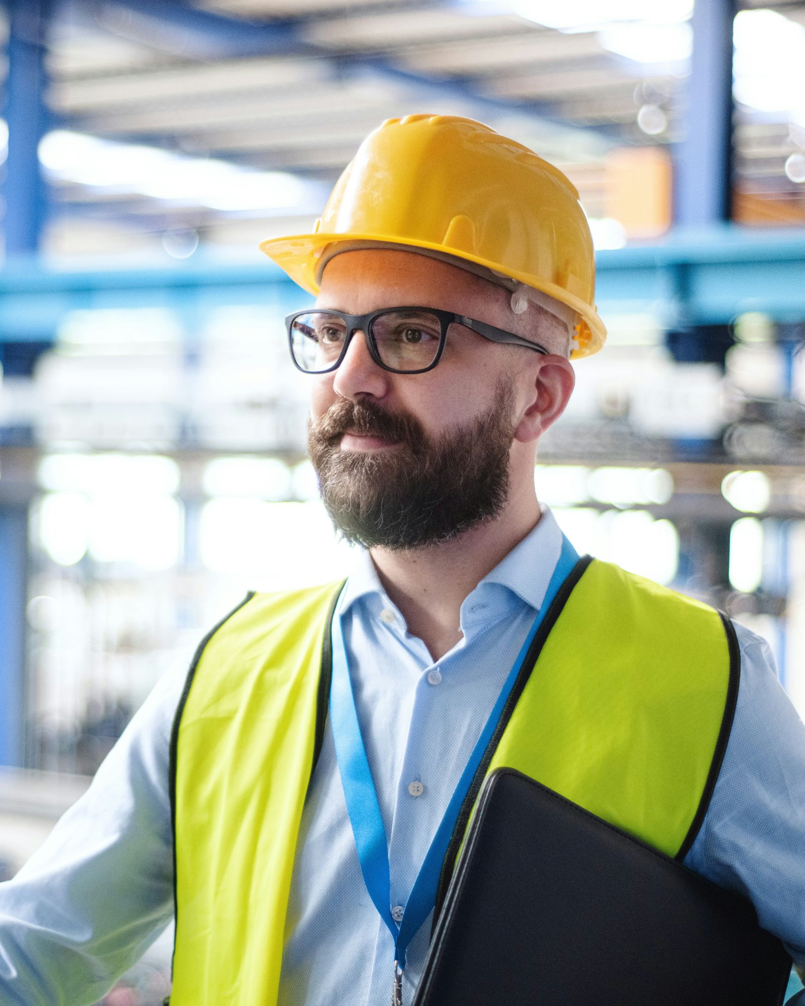 Maintenance technician inspecting industrial equipment